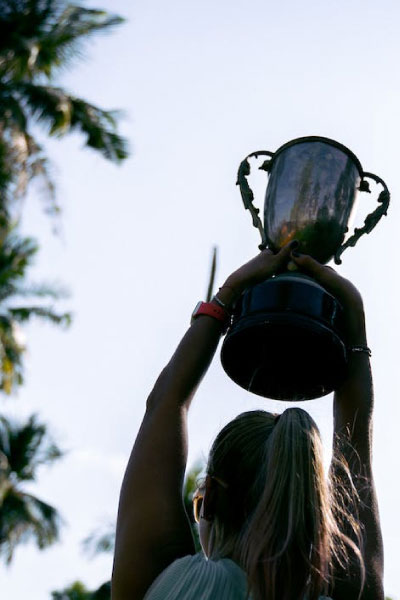 person holding trophy
